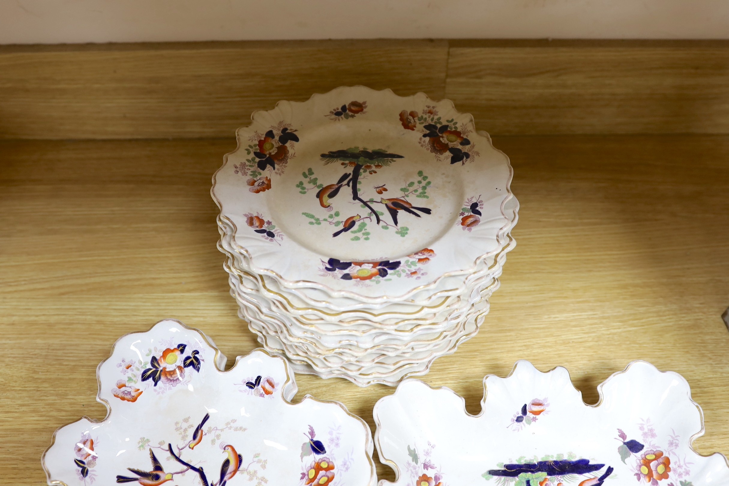 A mid 19th century opaque china dessert service by W. Baker & Co.